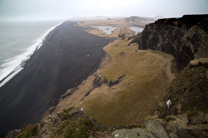 Landscape photograph shot from above of Black Sand Beach in Iceland