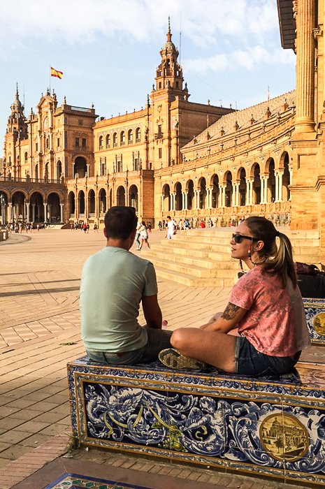 A couple relaxing outside a famous building