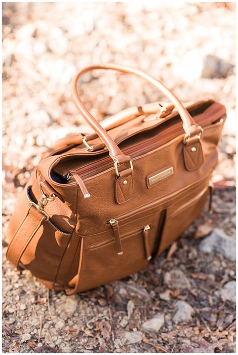 The Kelly Moore Libby bag laying on the ground.
