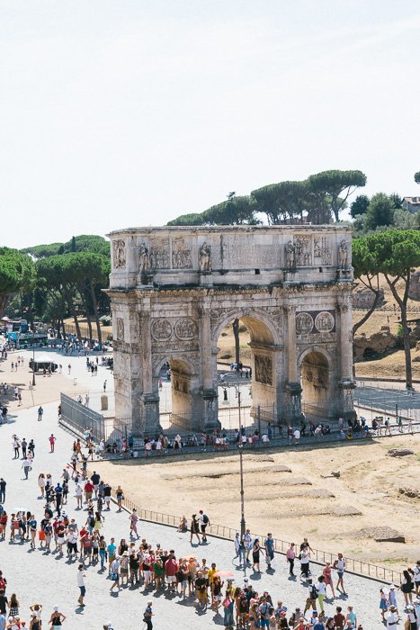 Travel photography of crowds of tourists in Rome.