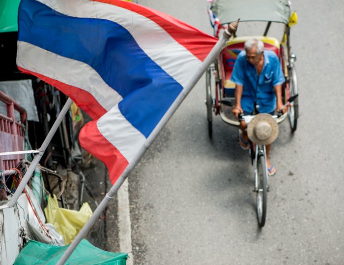Documentary travel photography telling the story of your location by including a flag.