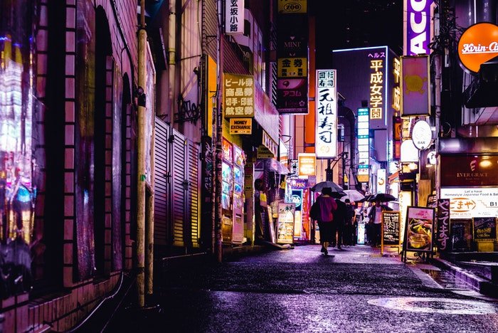 a Japanese street scene at night