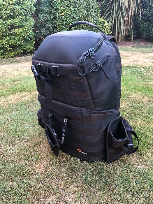 A large backpack for travel photography on the grass
